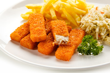 Fried fish sticks with french fries on white background