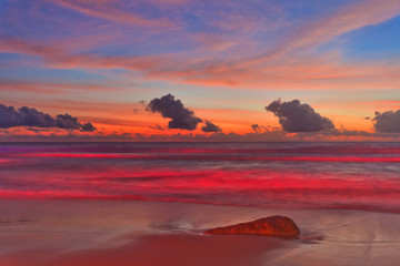 Tropical beach after sunset in beach lights.