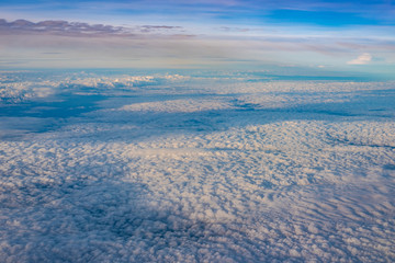 The Altocumulus cloud formation view from aircraft window