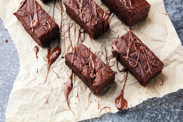 homemade chocolate brownies on grey vintage background, chocolate cake concept
