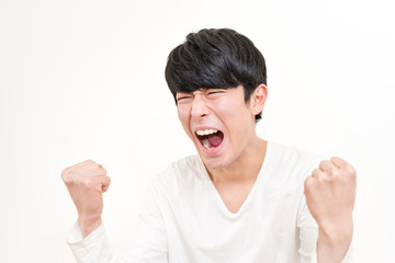 ガッツポーズ・男性