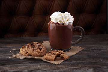 hot chocolate with cocoa and chocolate chip cookies.