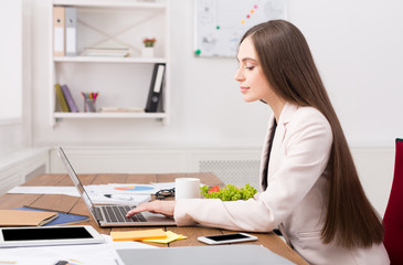 Business woman working on laptop at office