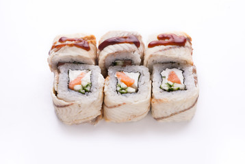 Set of salmon and eel rolls isolated on white, closeup