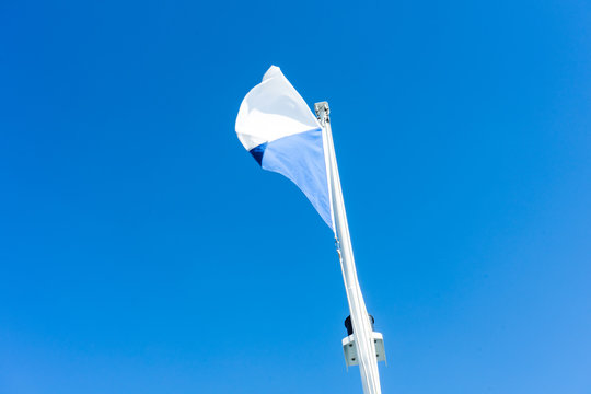 Flag Of Zurich Switzerland With Blue Sky