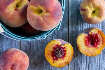 Fresh organic yellow peaches and peach salsa