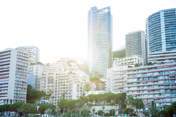 Monaco, Europe - August 16, 2017 City during sunset. International business center Monaco. Sun is shining through hotels and business buildings.
