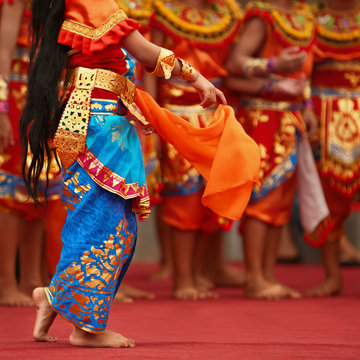 Balinese dancer girls in traditional Sarong costume dancing Legong dance