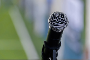 Fototapeta premium Microphone on blur background.