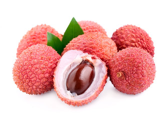Sweet lychees fruits with leaves .