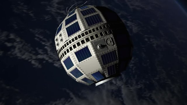Telstar, the World's first transatlantic broadcast satellite, 1961, orbiting Earth.