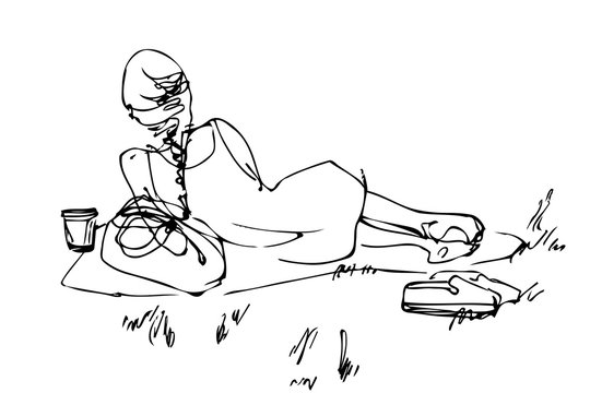 picnic girl resting lying on the grass
