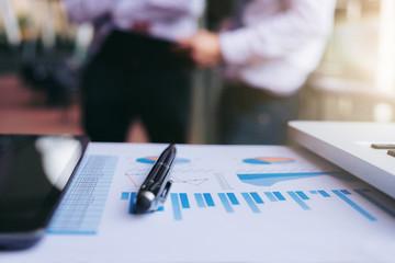 Teamwork process, Close up of pen, Blurred abstract background of Business people meeting