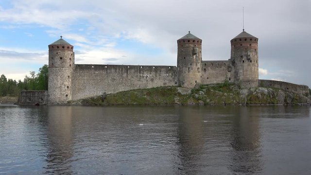 The medieval Olavinlinna castle, cloud day in june. Savonlinna, Finland