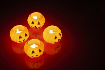 glowing pumpkin candle halloween concept