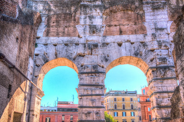 The circular arcs of Colosseum, Flavian Amphitheatre, in Rome, Italy