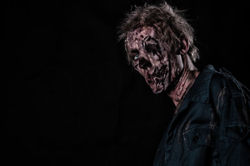 Bloody zombie man with brains out horror halloween
