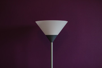 The modern lamp on the purple pastel wall concept of minimalism interior and soft tone for house decoration