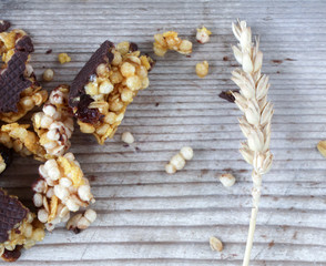 Healthy cereal bars on wood background