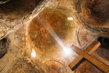 Mtskheta Georgia. Bottom View Of Big Wooden Cross On Stone Walls
