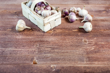 Garlic. Garlic Cloves and Garlic Bulb on a wooden vintage rustic table.