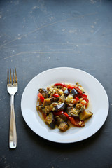 Vegetable stew on white plate