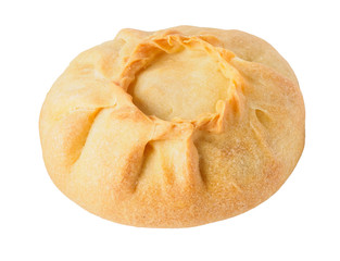 Tatar round pie on the table with napkin