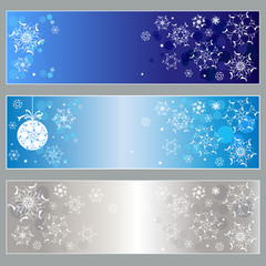 Set of horizontal banners with white snowflakes. Vector illustration