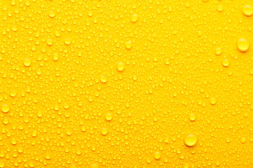 water drops on a yellow background