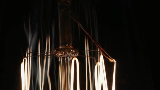 Dolly slide of glowing edison lamp