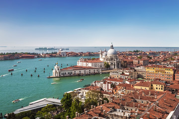 Fototapeta na wymiar Panoramic view on Venice and the Basilica Santa Maria della Salute from the bell tower of St. Mark's Cathedral, Italy