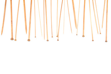 Wooden knitting needles frame on white background
