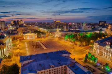 Fototapeta premium Evening summer cityscape from rooftop. Lenin Square, Voronezh downtown