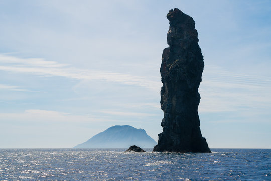 The columnar cliff La Canna in front of the island of Filicudi.