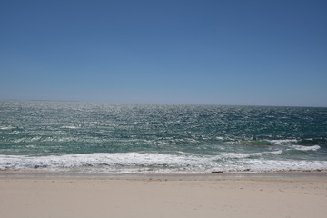 Fototapeta na wymiar Sandy beach of Floreat Beach at Indian Ocean in summer, Western Australia