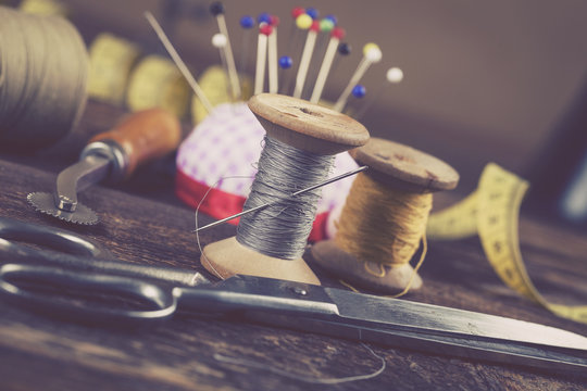 Sewing instruments, threads, needles, bobbins and materials.