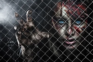 Foto op Plexiglas Close-up portrait of horrible zombie woman with wounds. Horror. Halloween poster. © Mike Orlov