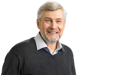 Obraz premium Smiling mature man close up. Portrait of elderly white-skined man smiling on white background.