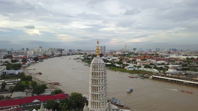 4K Aerial view around top of pagoda at Wat Arun temple
