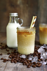Thai iced coffee in a mason jar.