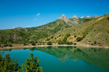 Naklejka na ściany i meble Lake Panagia, view of the village of Zelenogorye, Crimea