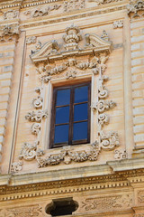Baroque window of Celestini palace, Lecce, Apulia, Italy