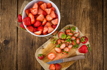 Fresh made Sliced Strawberries on a rustic background