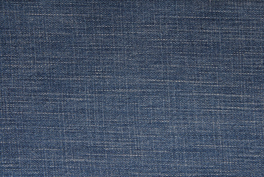 blue denim background, jeans fabric, close-up of jeans textile