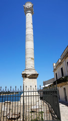 Ancient roman column, which is a landmark of Brindisi, Puglia, Italy - obrazy, fototapety, plakaty