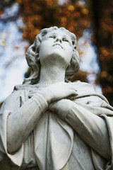 Fragment of ancient statue of Mary Magdalene (Prayer, faith, religion, love, hope concept)