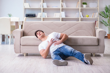 Man suffering from sick stomach and vomiting