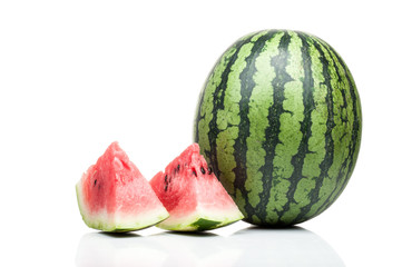 watermelon with slices standing isolated on white background