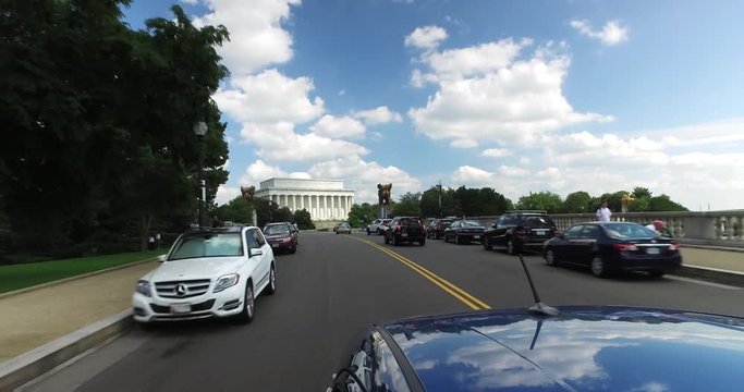 WASHINGTON, D.C. - Circa August, 2017 - A reverse driving perspective on the Arlington Memorial Bridge with the Lincoln Memorial in the distance.  	