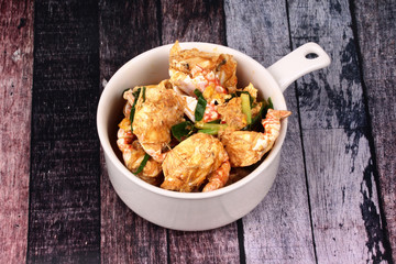 Stir-fried crab in curry powder is top-ten of popular Thai food.